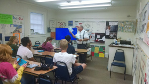 Mr. Sabbadino begins his lesson for the evening.